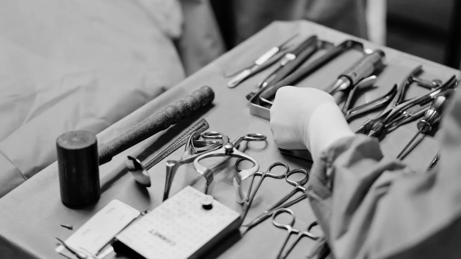 Tray of surgical tools for a medical procedure, used in discussions about tariffs and hospital supply chain costs
