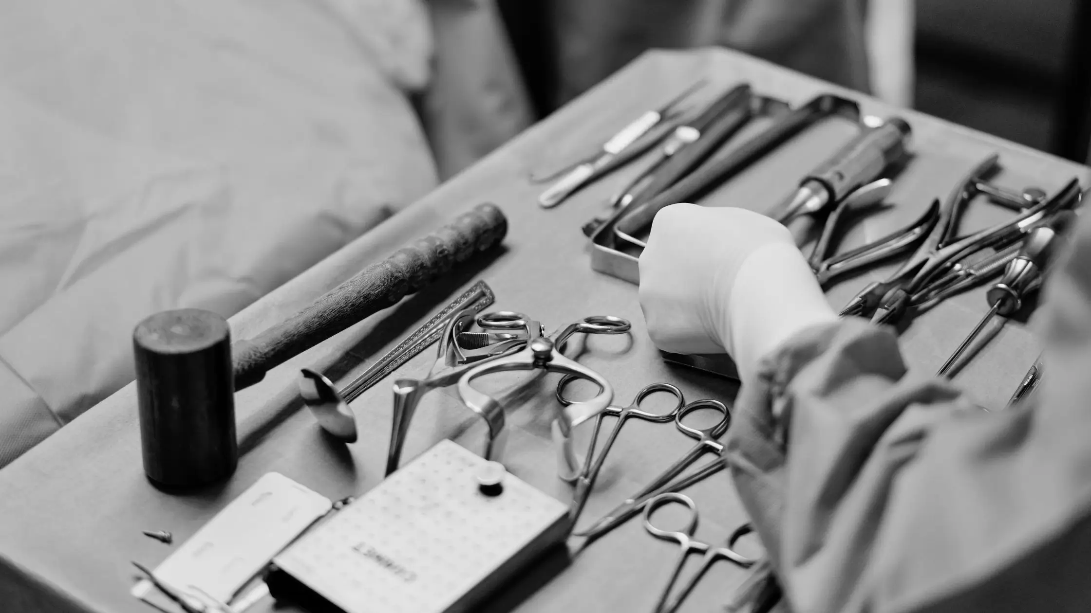 Tray of surgical tools for a medical procedure, used in discussions about tariffs and hospital supply chain costs