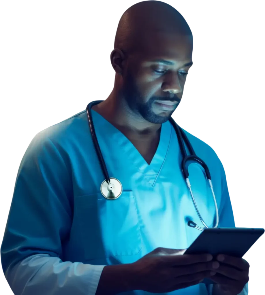A physician using a tablet device